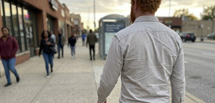 What a patternmaker notices first shoulder seam off the bone Man walking with bad shoulder fit seam sliding off bone on sidewalk